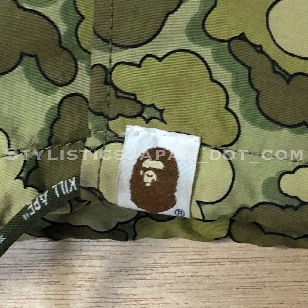 A Bathing Ape Bape x Kaws Cloud Camo Nylon Coaches Jacket Olive M