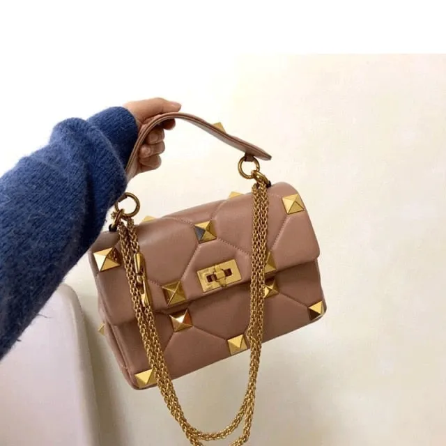 leather luxury rivet handbag