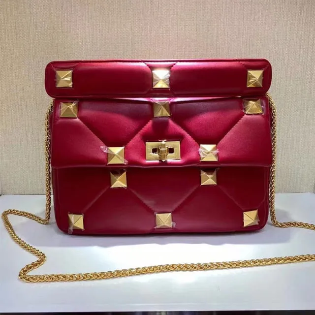 leather luxury rivet handbag