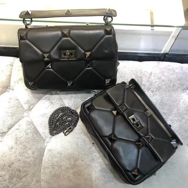 leather luxury rivet handbag