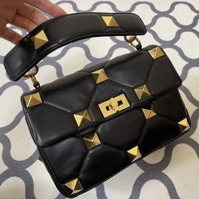 leather luxury rivet handbag
