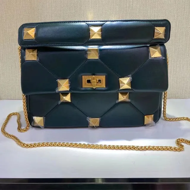 leather luxury rivet handbag