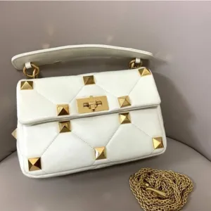 leather luxury rivet handbag