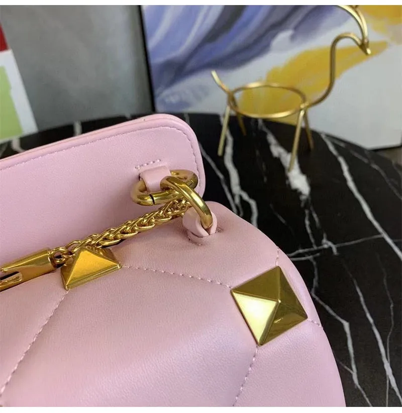 leather luxury rivet handbag