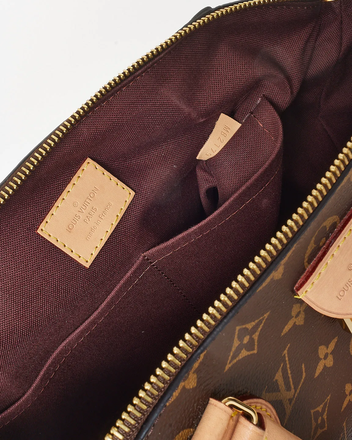 Louis Vuitton Monogram Canvas Rivoli MM Handbag