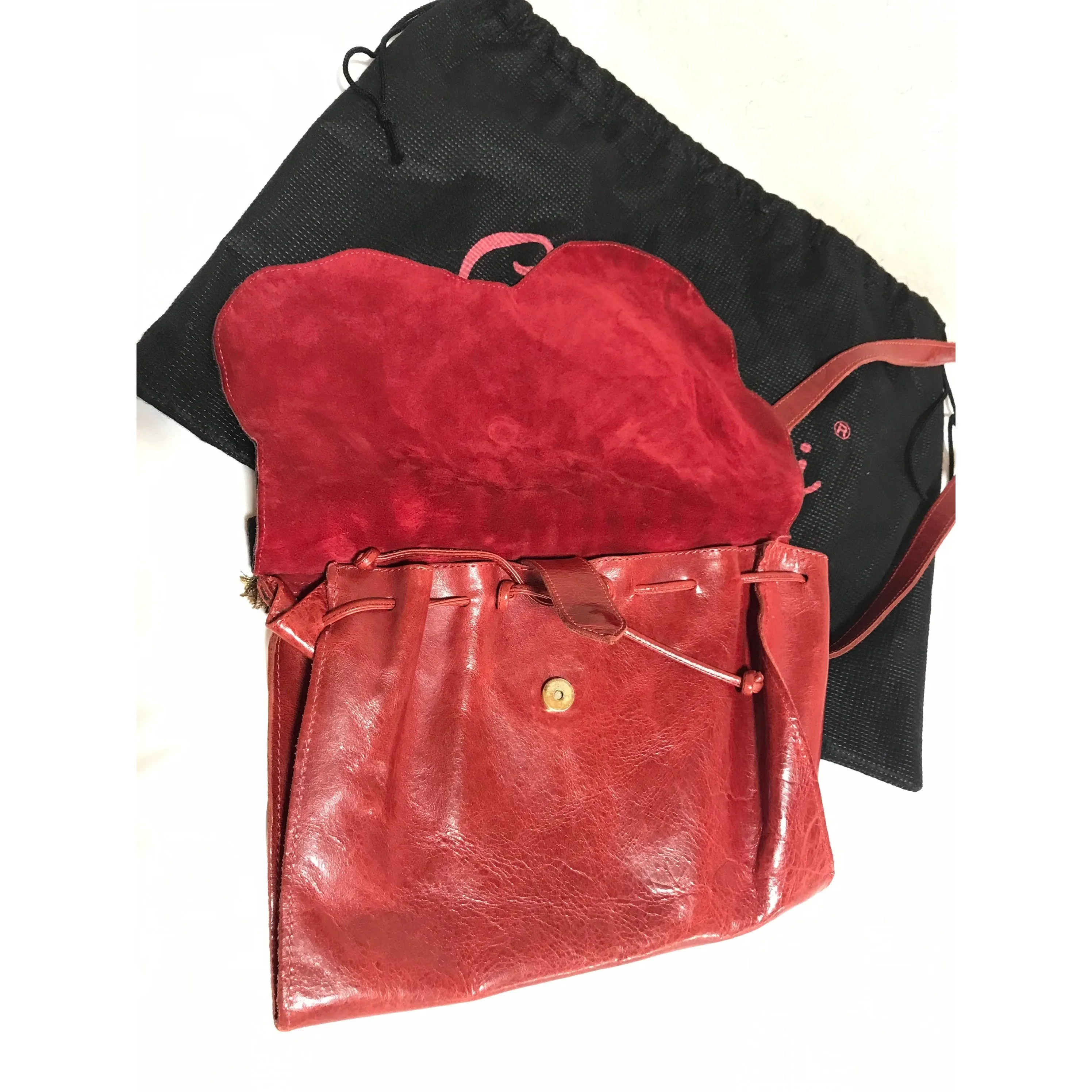 Vintage Carlos Falchi black and red leather book design messenger shoulder bag with emblem embroidery. 0602063