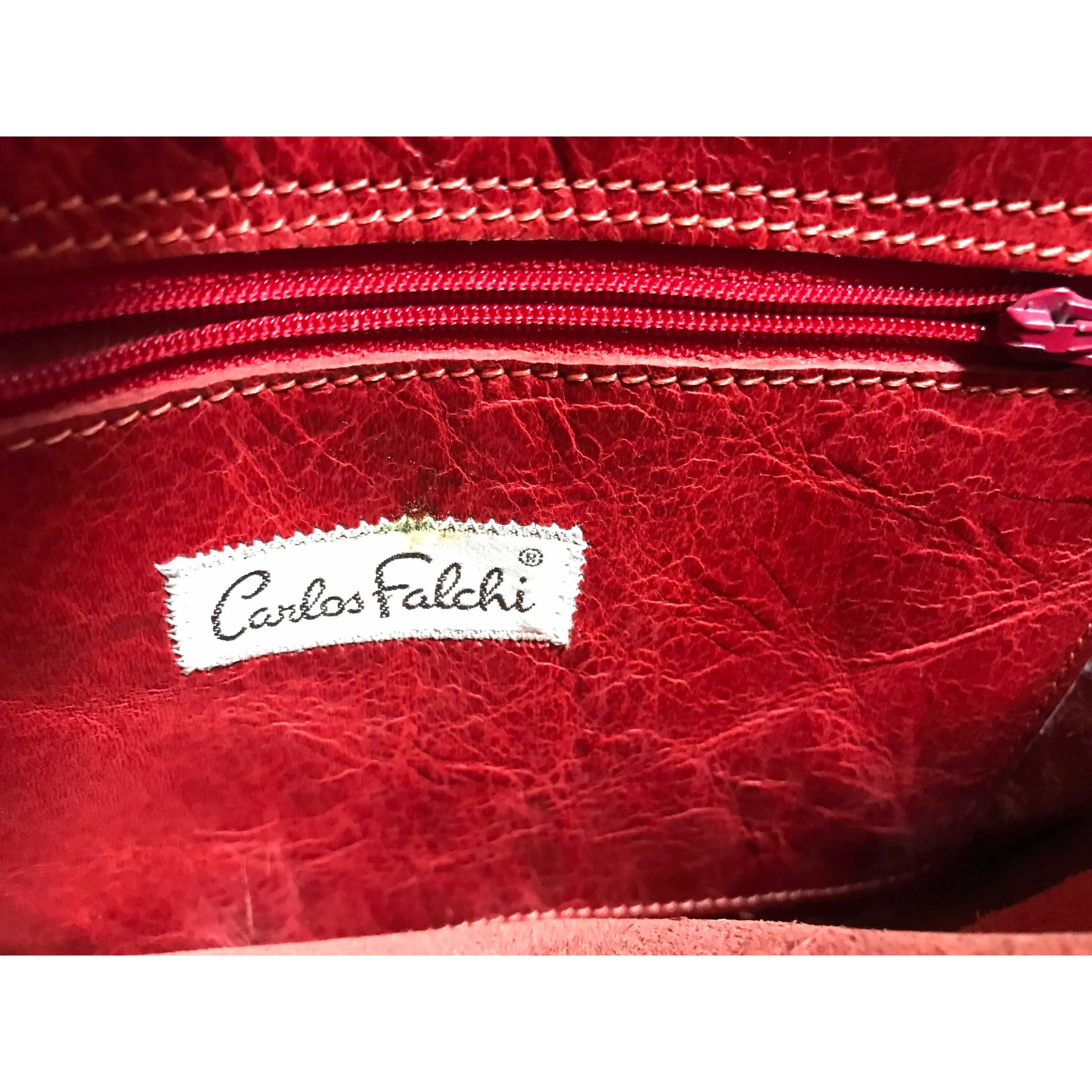 Vintage Carlos Falchi black and red leather book design messenger shoulder bag with emblem embroidery. 0602063